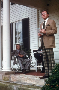 MWC president Prince Woodard giving remarks at Belmont on opening day Oct. 19 1975. Director Dick Reid is sitting.